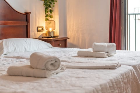 Premium bedding, free minibar items, desk, free WiFi