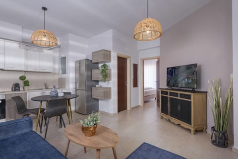 City Apartment | Living area | 40-inch Smart TV with satellite channels, TV