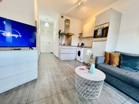Apartment, 1 Bedroom | Living room | 45-inch flat-screen TV with digital channels