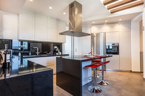 Luxury Apartment | Private kitchen | Full-size fridge, microwave, oven, stovetop