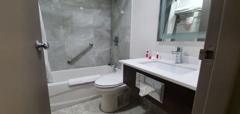 Standard Room, 2 Queen Beds | Bathroom | Combined shower/tub, hair dryer, towels