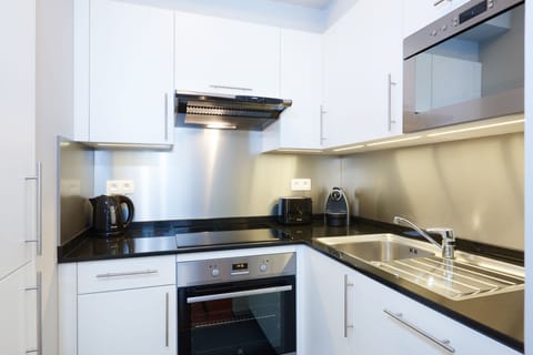 Apartment, 1 Bedroom (Street View) | Private kitchenette | Fridge, microwave, oven, stovetop