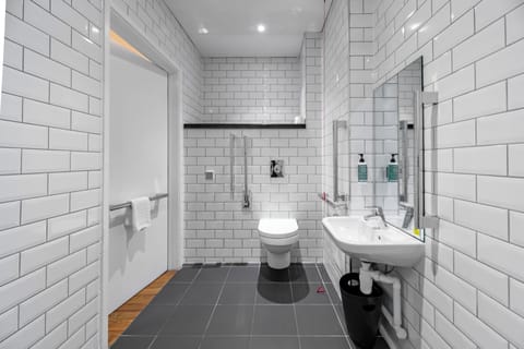 Accessible Double Room without Window | Bathroom | Shower, eco-friendly toiletries, hair dryer, towels