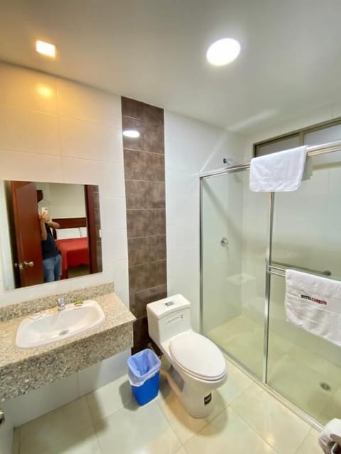 Family Triple Room | Bathroom | Shower, rainfall showerhead, hair dryer, towels