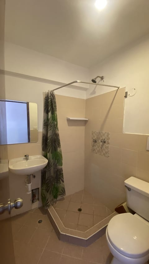 Economy Twin Room, 1 Bedroom | Bathroom | Shower, rainfall showerhead, towels, soap