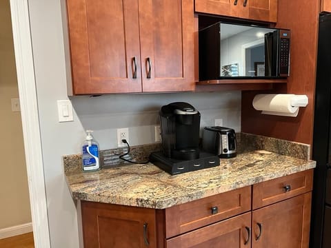 Fridge, microwave, coffee/tea maker, dining tables