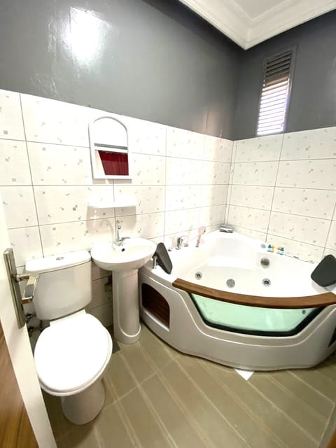 Romantic Room, 1 King Bed | Bathroom | Separate tub and shower, jetted tub, hydromassage showerhead