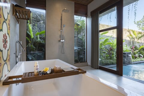 Luxury Villa | Bathroom | Spring water tub, rainfall showerhead, free toiletries, hair dryer