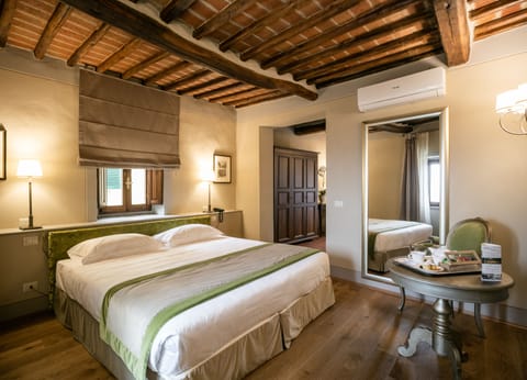 Premium bedding, down comforters, free minibar items, in-room safe