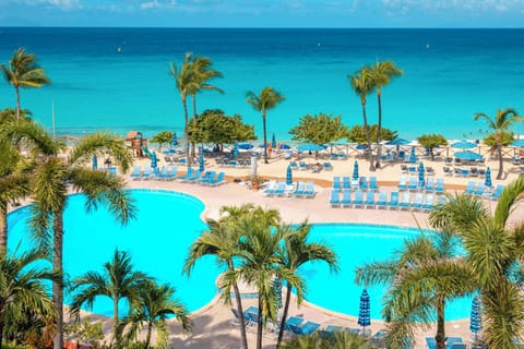 Outdoor pool, pool umbrellas, sun loungers