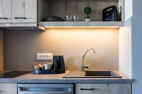 Mini-fridge, espresso maker, electric kettle, toaster