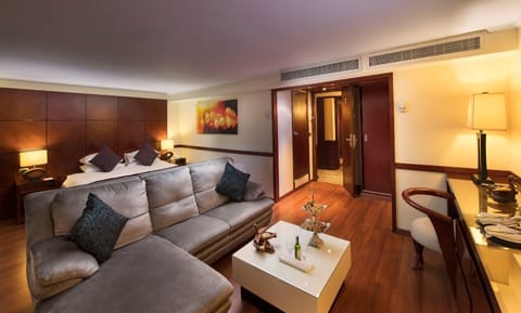 Twin Room | Living area | 32-inch LCD TV with satellite channels