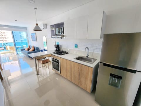 Honeymoon Apartment | Private kitchen | Full-size fridge, microwave, oven, stovetop