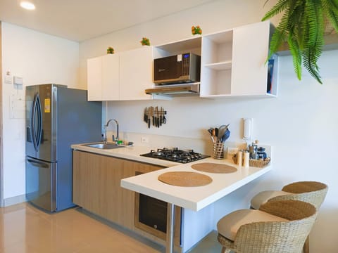 Royal Loft | Private kitchen | Full-size fridge, microwave, oven, stovetop