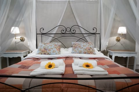 Junior Quadruple Room | Down comforters, in-room safe, desk, blackout drapes