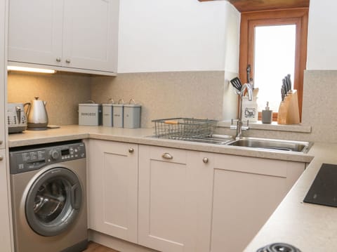 Fridge, electric kettle, toaster, cookware/dishes/utensils