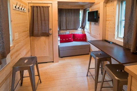 House, 1 Bedroom (Pets OK, Tiny House, Linens Included) | Living area | 32-inch flat-screen TV with cable channels