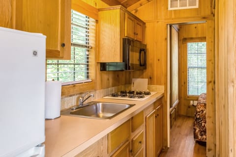 Fridge, microwave, coffee/tea maker, cookware/dishes/utensils