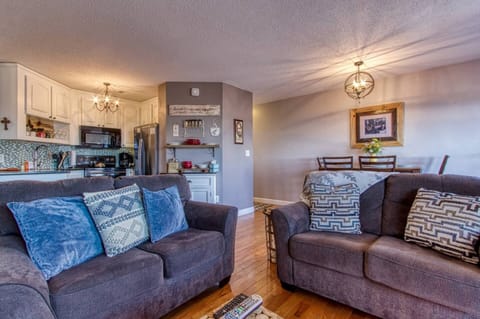 Signature Cabin, 2 Bedrooms, Balcony, Mountain View | Living room | 48-inch Smart TV with cable channels, TV, fireplace