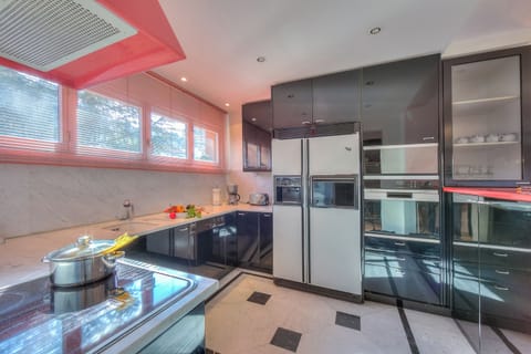 Standard Apartment, 2 Bedrooms, Refrigerator & Microwave (Residenza Borgo Rustico) | Private kitchen | Fridge, microwave, oven, stovetop