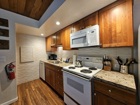 Condo, 4 Bedrooms | Private kitchen | Fridge, coffee/tea maker, toaster