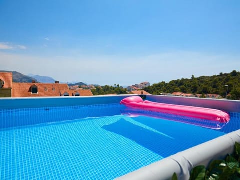 Seasonal outdoor pool, pool umbrellas, sun loungers