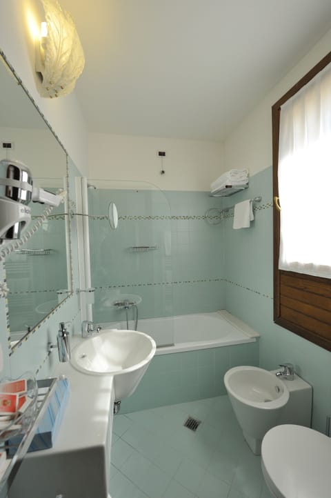 Hair dryer, bidet, towels, soap