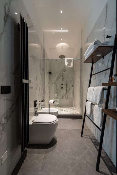 Suite, Bathtub | Bathroom | Designer toiletries, hair dryer, bathrobes, slippers