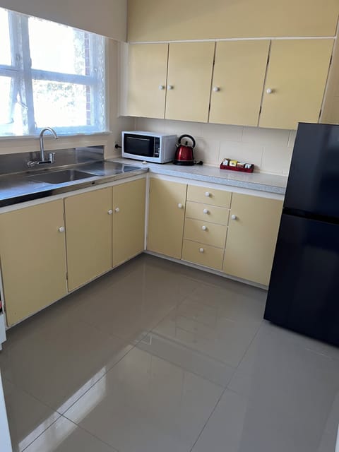 Family Apartment | Private kitchen | Microwave, stovetop, coffee/tea maker