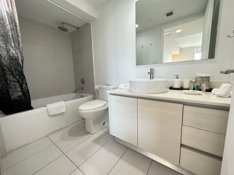 Exclusive Apartment | Bathroom | Hair dryer, towels, soap, shampoo