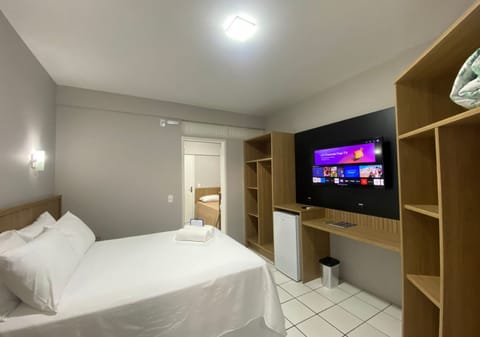 Superior Triple Room | Minibar, in-room safe, individually decorated, individually furnished