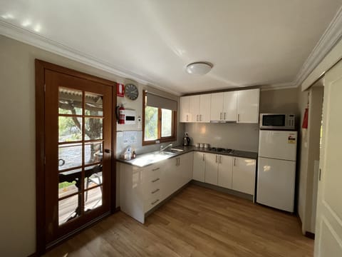 Family Chalet, 2 Bedrooms, Non Smoking, Garden View | Private kitchen | Mini-fridge, microwave, stovetop, electric kettle