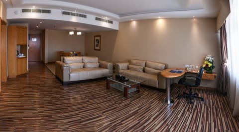 Executive Suite, 1 Bedroom | Living room | TV