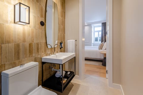 Superior Room | Bathroom | Hair dryer, towels