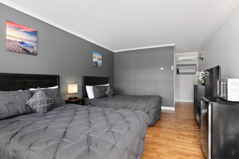 Room, 2 Queen Beds | Premium bedding, blackout drapes, free WiFi, bed sheets