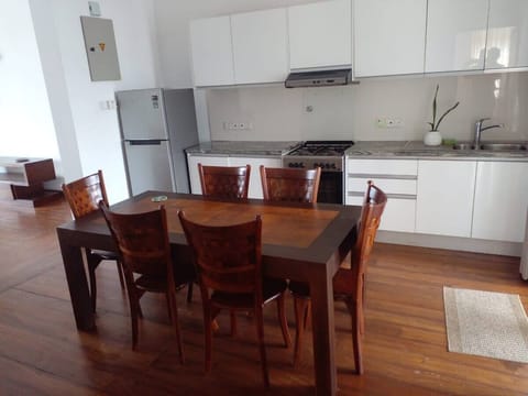 Luxury Apartment | Private kitchen | Microwave, rice cooker, cookware/dishes/utensils, kitchen islands