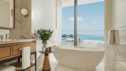 Separate tub and shower, deep soaking tub, rainfall showerhead