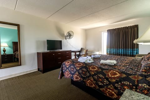 Classic Room, 1 King Bed, Poolside | Down comforters, memory foam beds, individually decorated