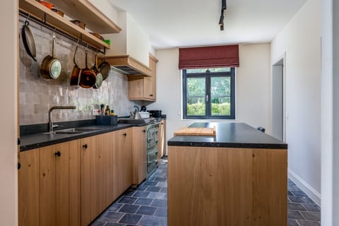 Family Cabin, Multiple Beds | Private kitchen | Coffee/tea maker