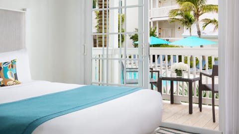 Pool and Garden View King with Balcony | Premium bedding, minibar, in-room safe, desk