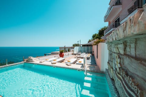 Seasonal outdoor pool, pool umbrellas, sun loungers