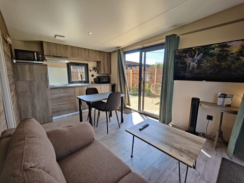 Premium Cottage | Living area | 120-cm LED TV with digital channels, TV, Netflix