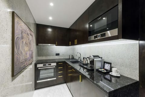 Presidential Suite, 1 King Bed, Non Smoking | Private kitchen | Espresso maker, electric kettle, highchair