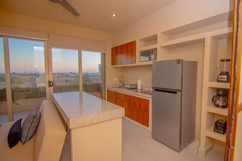 Comfort Apartment | Private kitchen | Full-size fridge, microwave, stovetop, coffee/tea maker