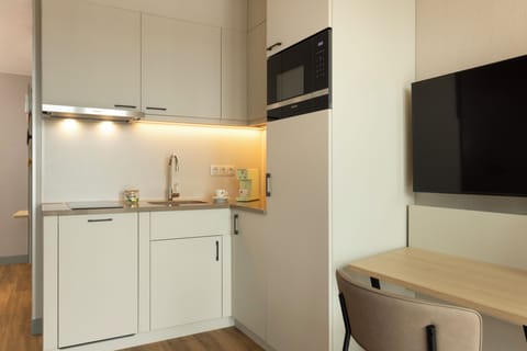 Studio, 2 Twin Beds | Private kitchen | Full-size fridge, microwave, dishwasher, coffee/tea maker