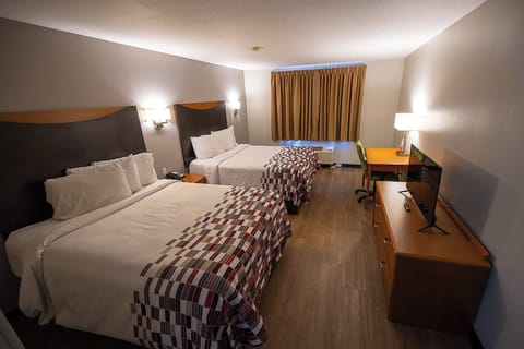 Deluxe Room, 2 Queen Beds (Smoke Free) | Desk, laptop workspace, blackout drapes, iron/ironing board