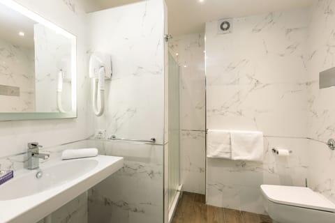 Shower, free toiletries, hair dryer, slippers