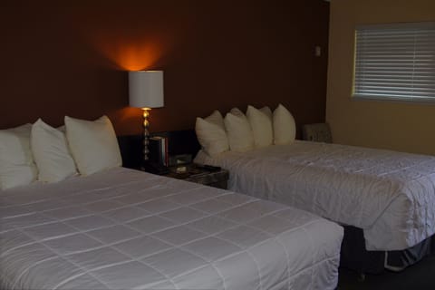 Superior Room, 2 Queen Beds | In-room safe, desk, iron/ironing board, cribs/infant beds