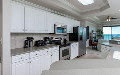 Condo, 4 Bedrooms | Private kitchen | Fridge, oven, coffee/tea maker, toaster