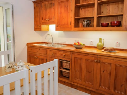 Fridge, electric kettle, toaster, cookware/dishes/utensils